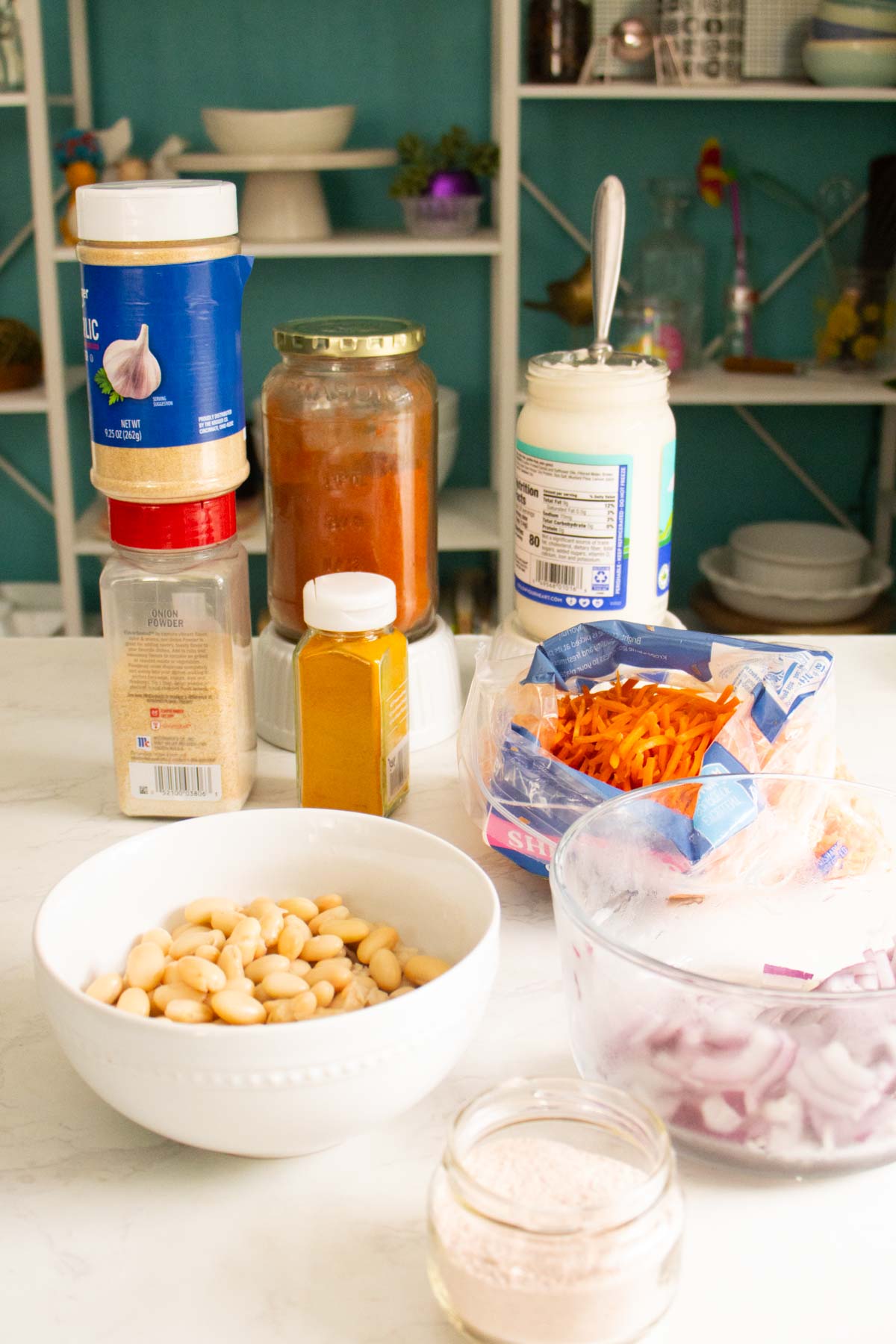 smashed white bean salad ingredients on the kitchen counter