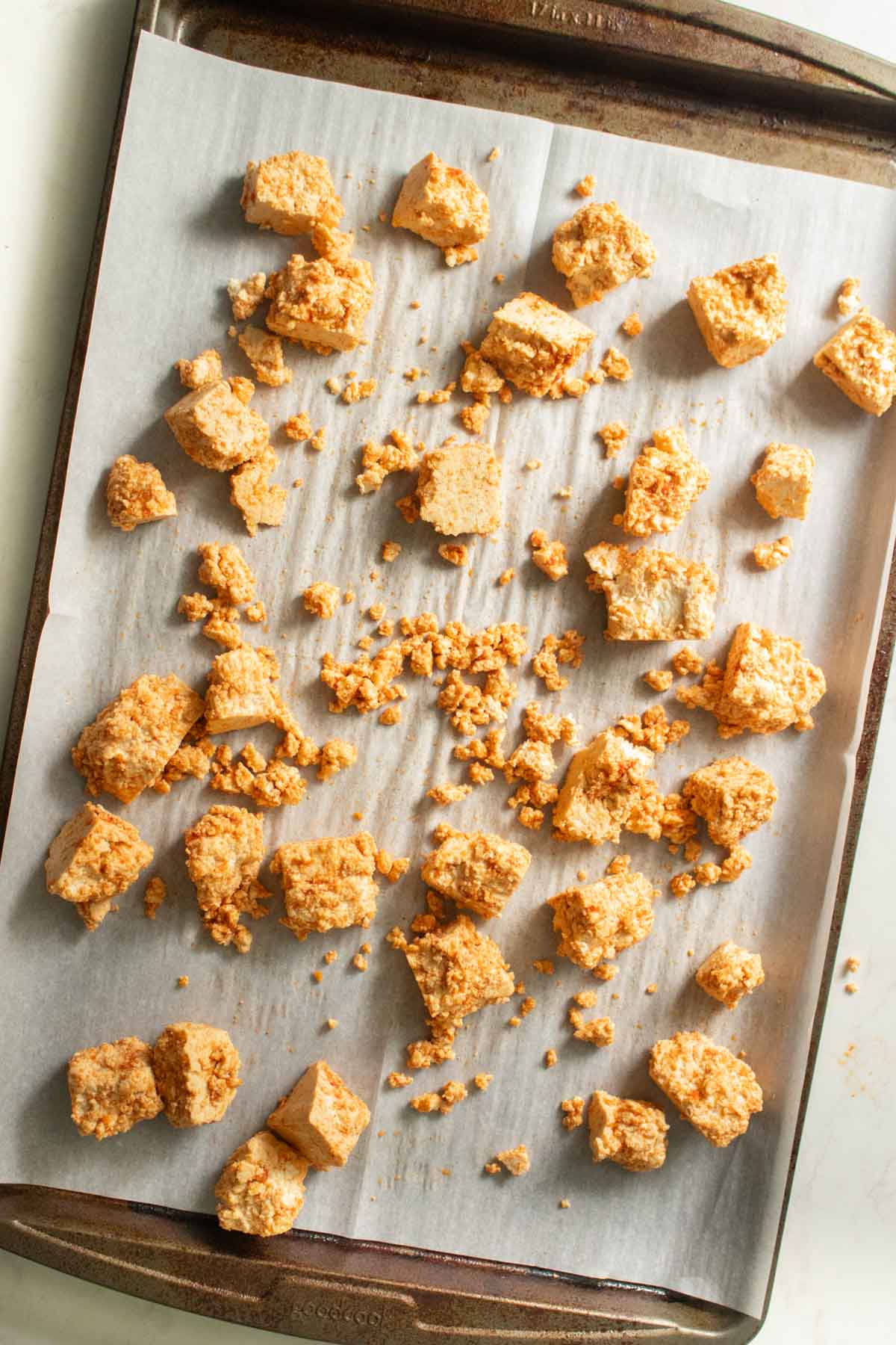 tofu on the baking sheet before baking