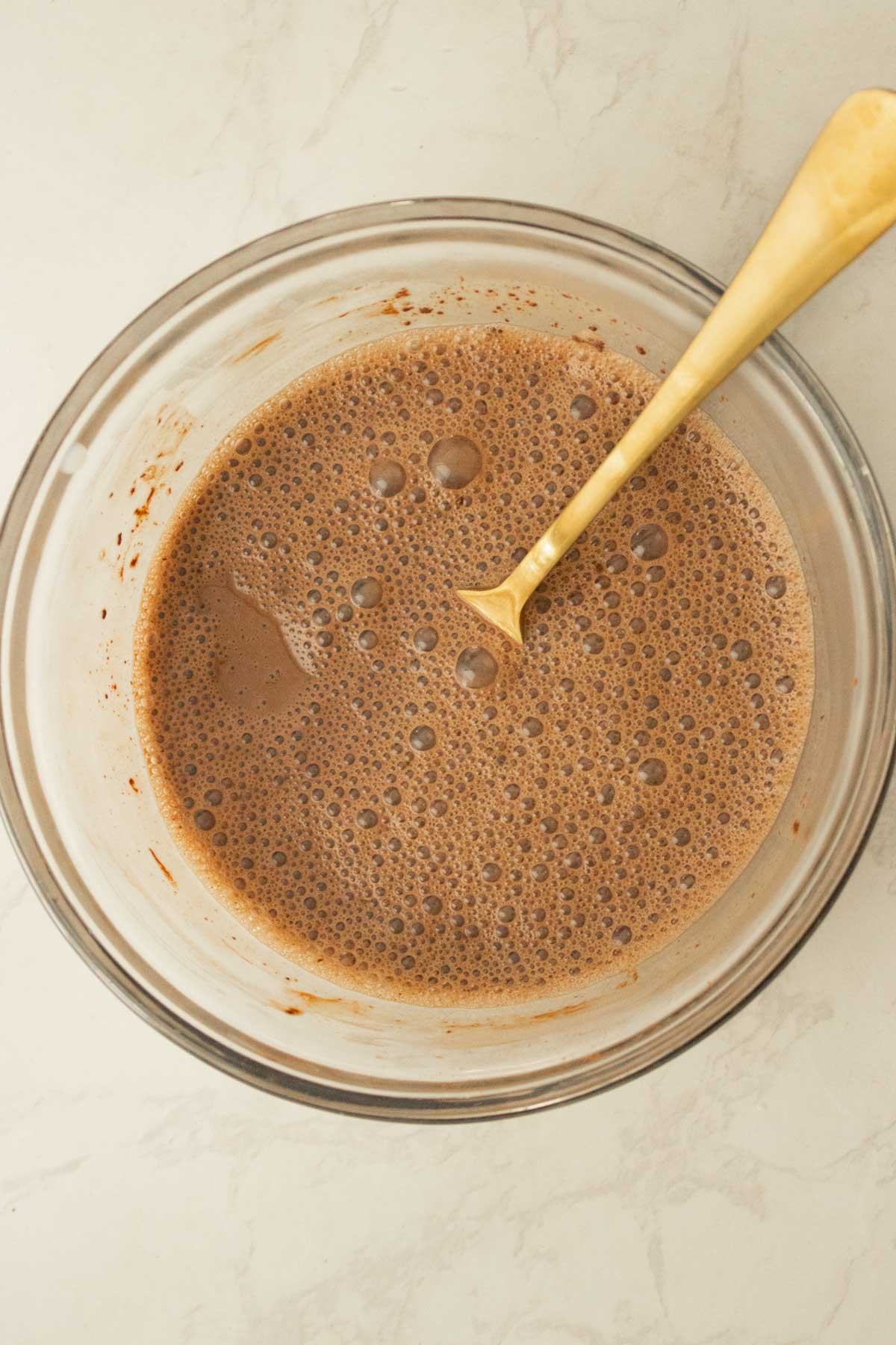 cocoa powder mixed with warm non-dairy milk