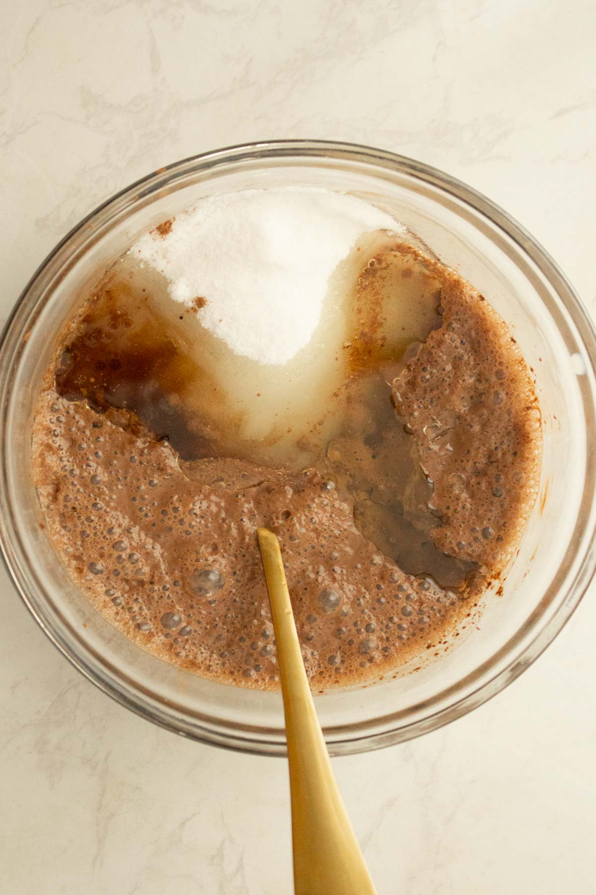 adding wet ingredients to the cocoa mixture