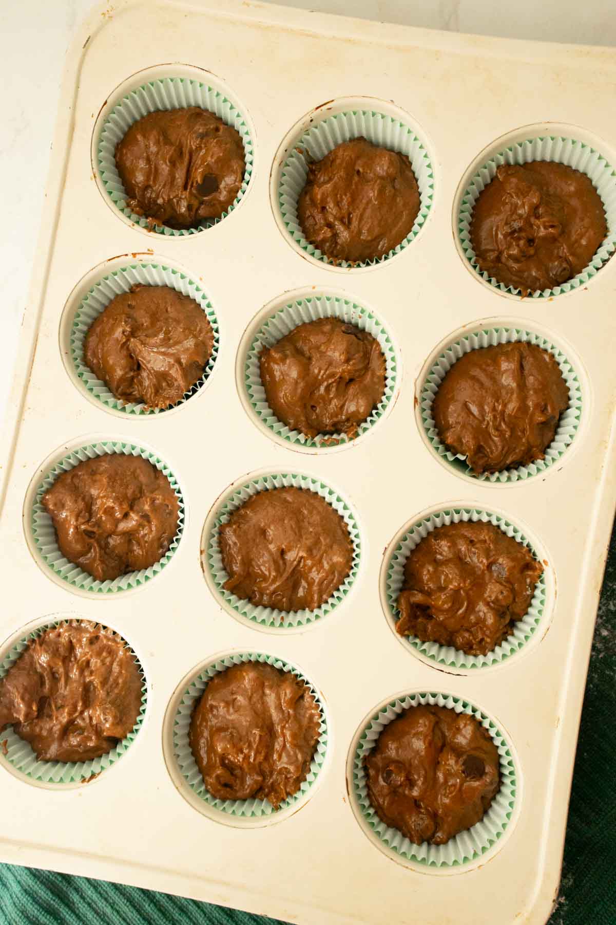 vegan double chocolate muffins in the pan before baking