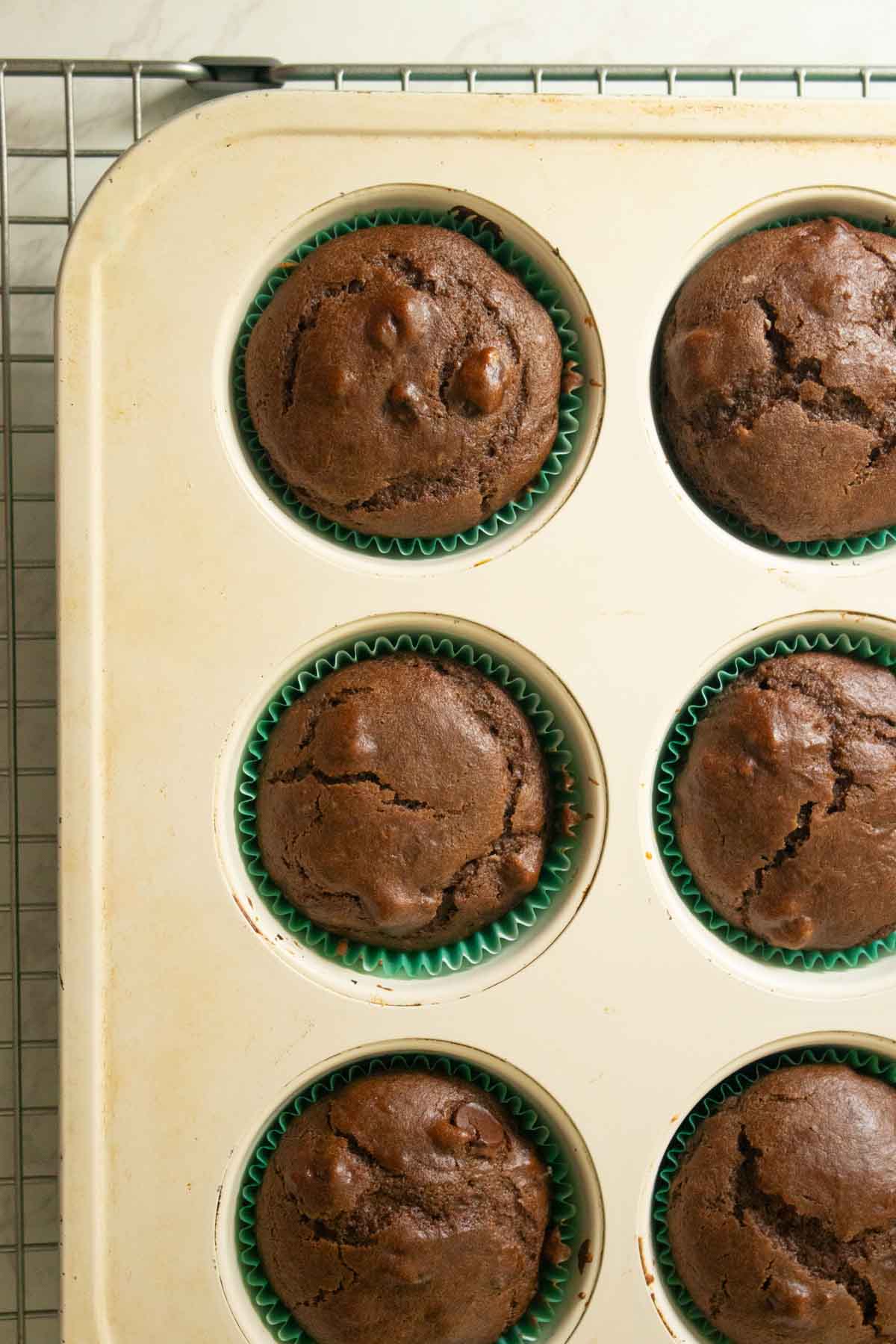 close-up of vegan double chocolate muffins in the baking pan
