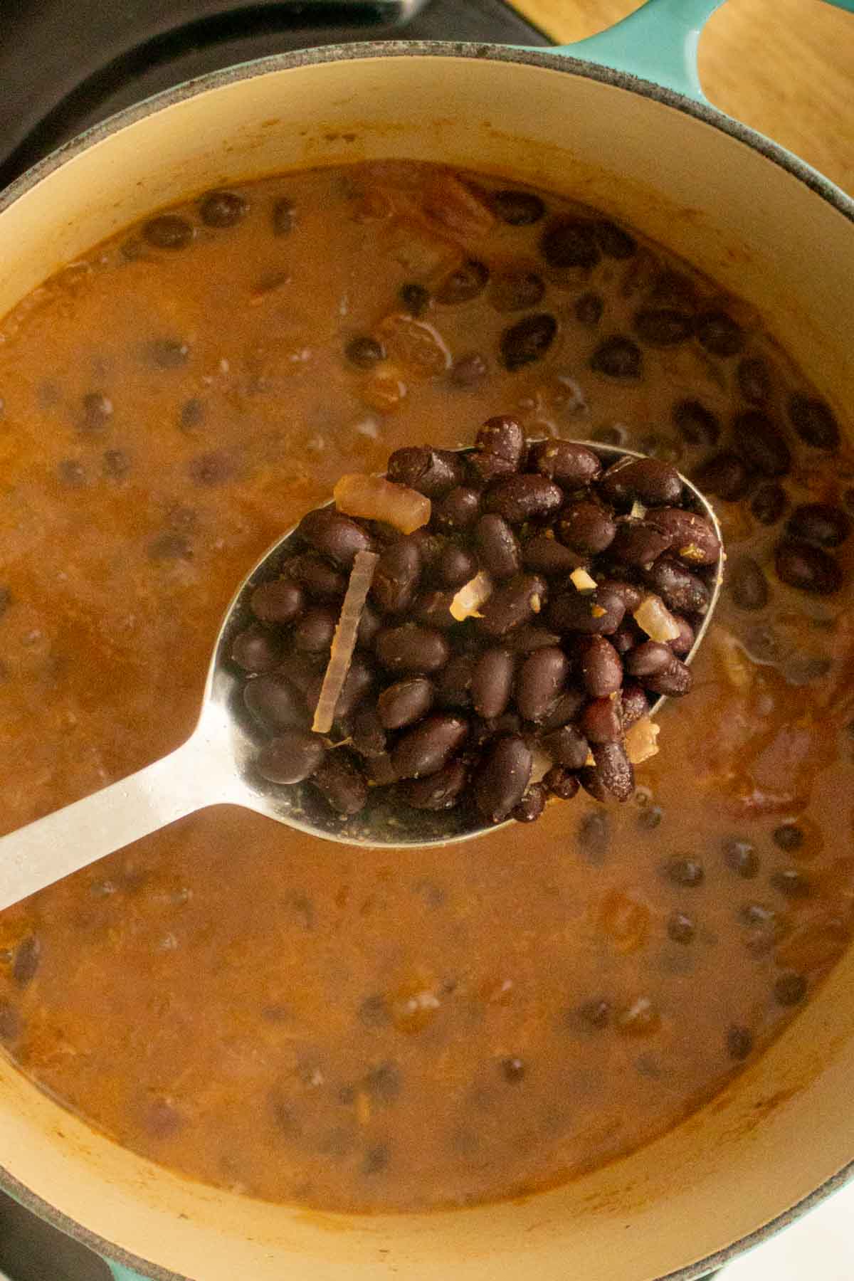 spoon serving smoky black beans
