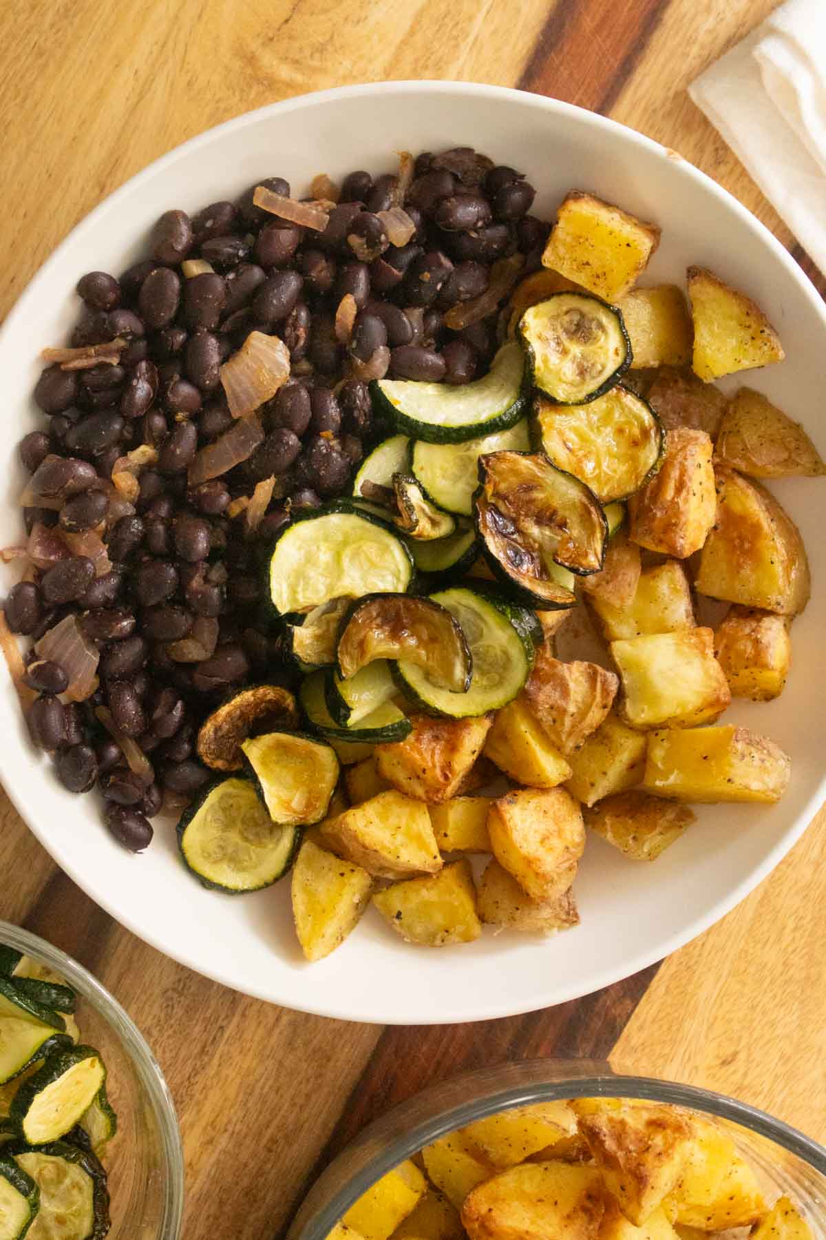 smoky black bean bowls with potatoes and zucchini
