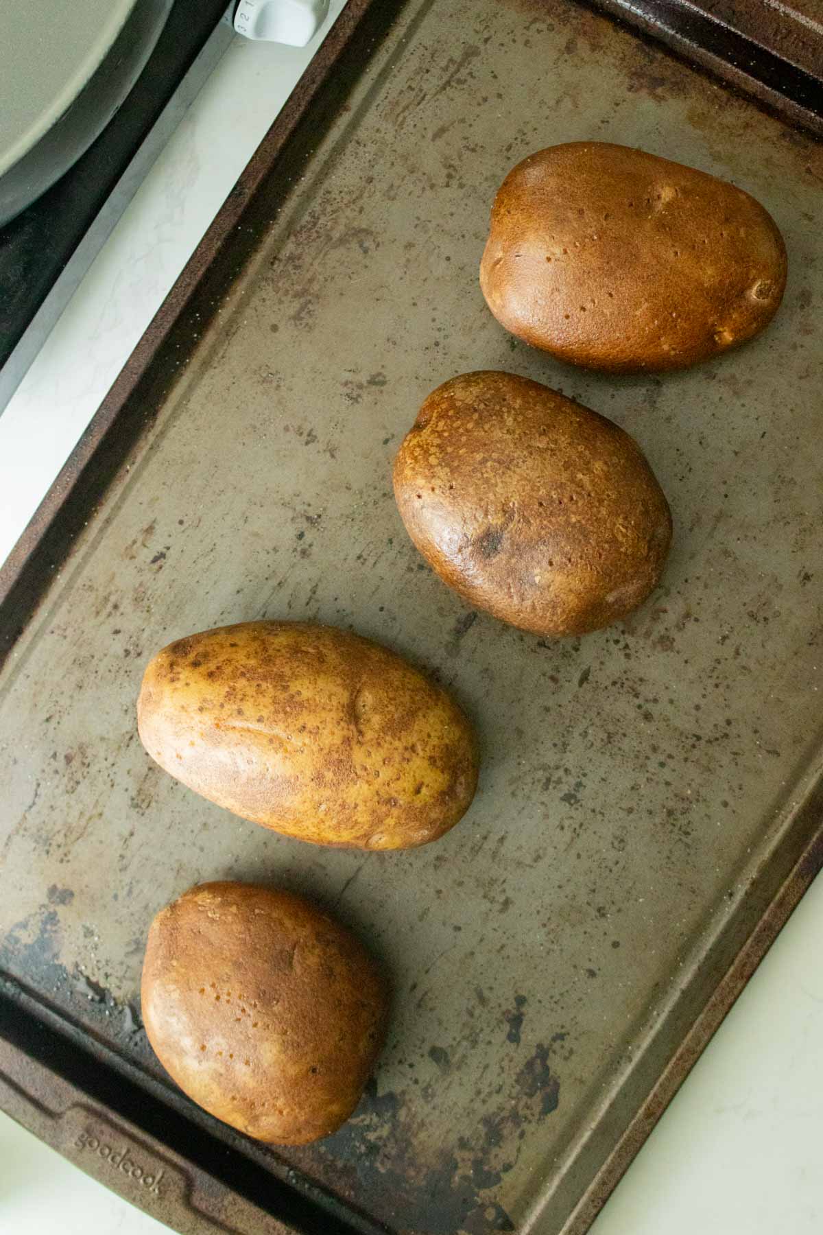 potatoes on the baking sheet before baking