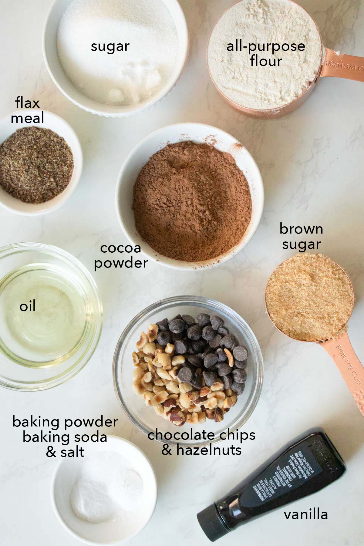 chocolate hazelnut cookies ingredients on the kitchen counter with text labels