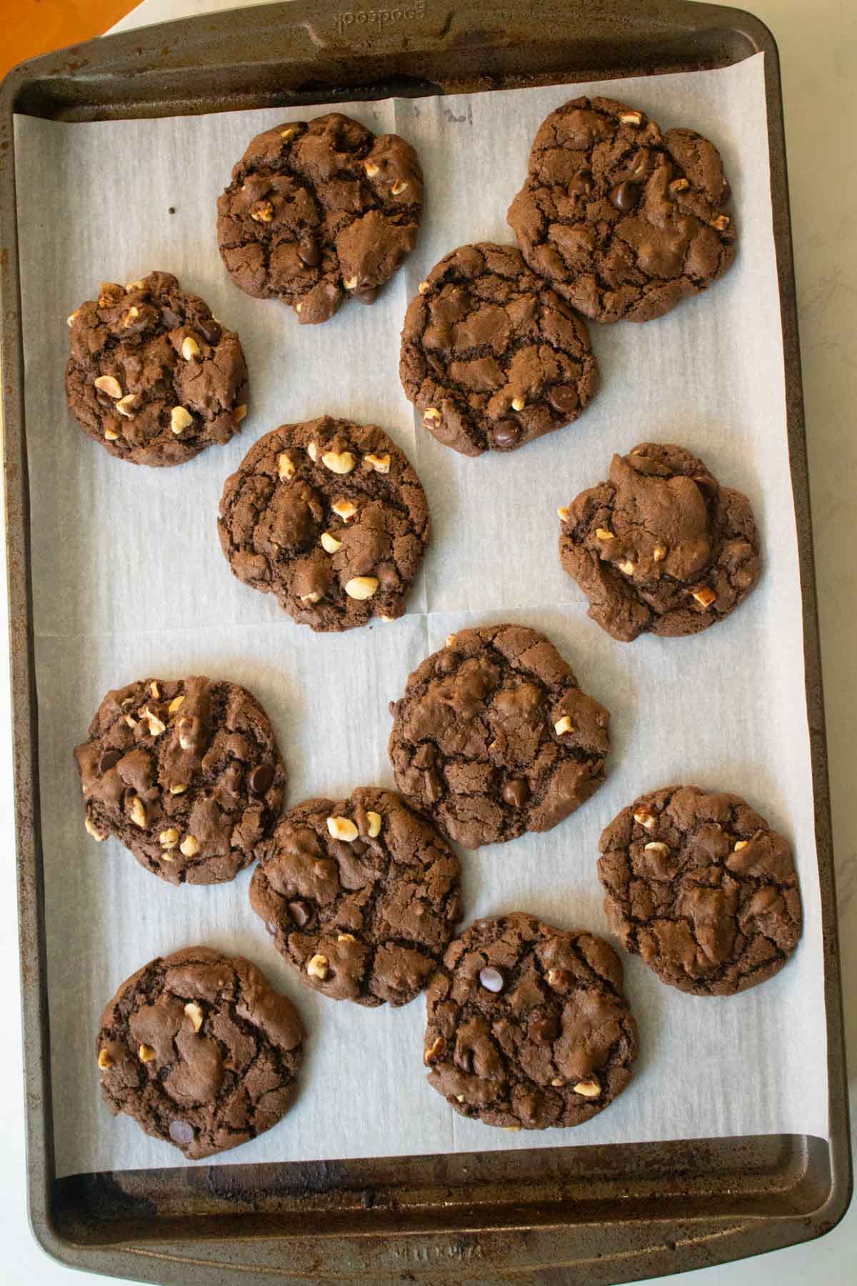 chocolate hazelnut cookies on the baking sheet after baking