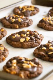 close-up of chocolate hazelnut cookies on the baking sheet