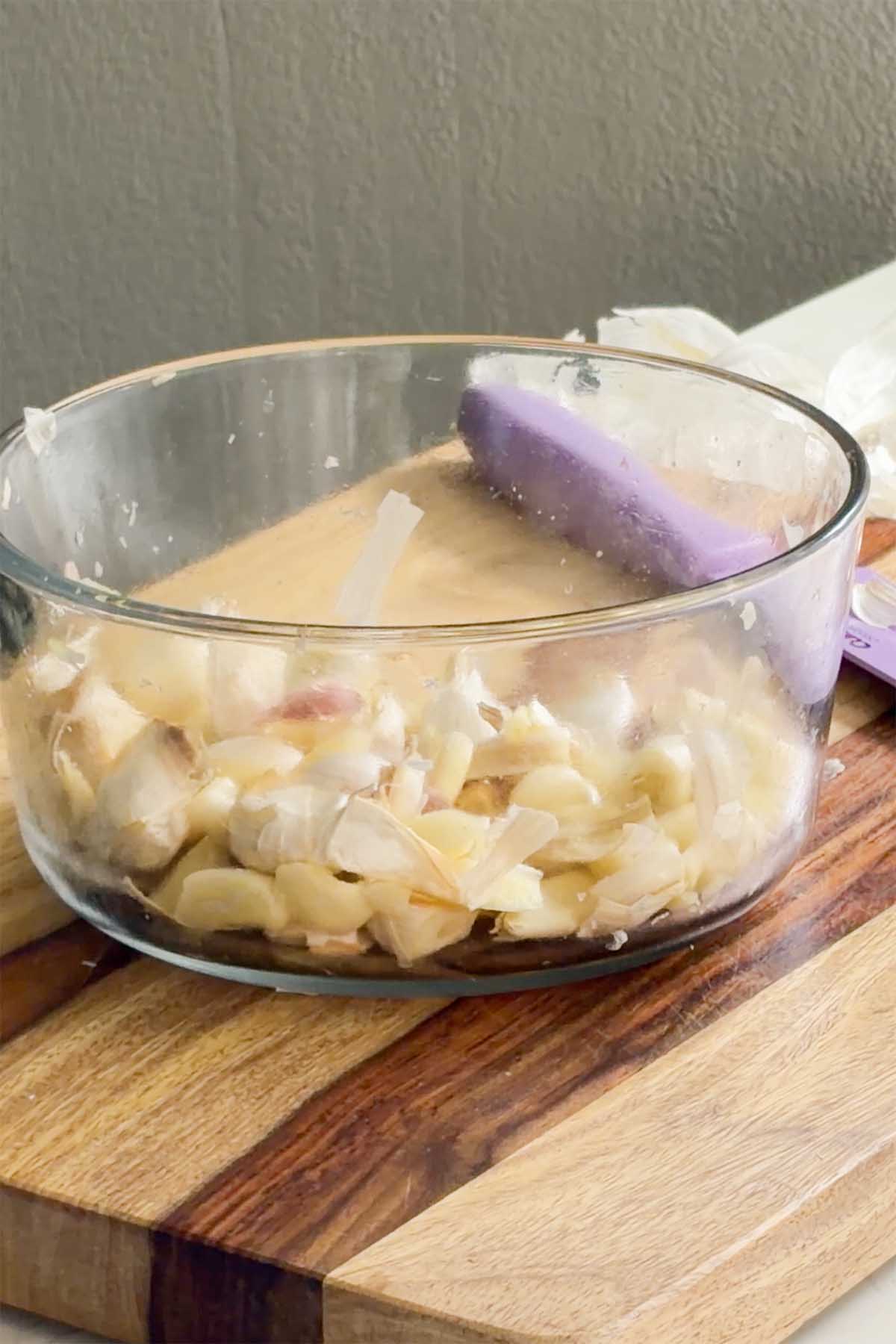 peeled garlic in a bowl