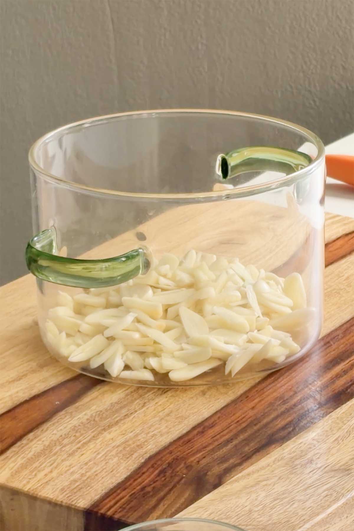 sliced garlic in the pan before adding other brine ingredients