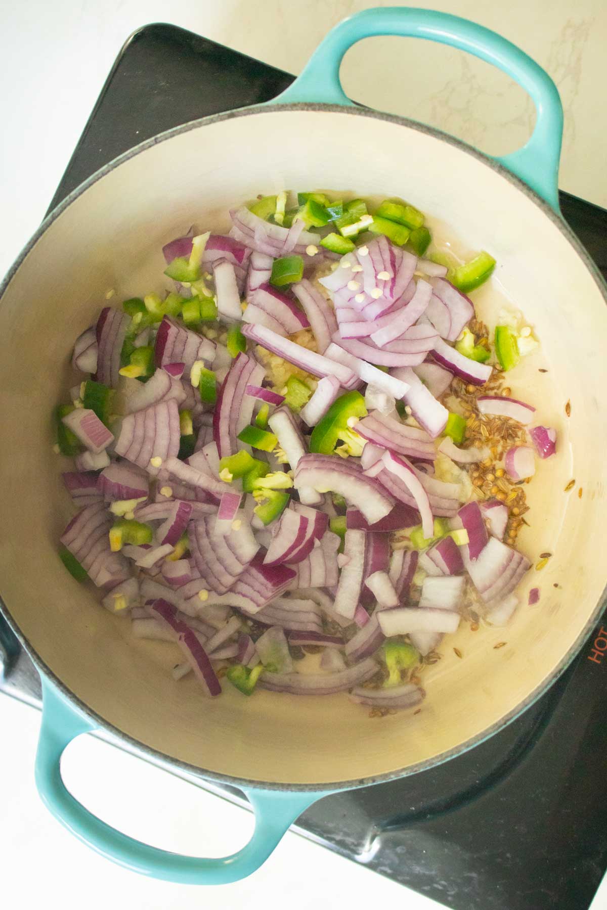 adding aromatics to the pan