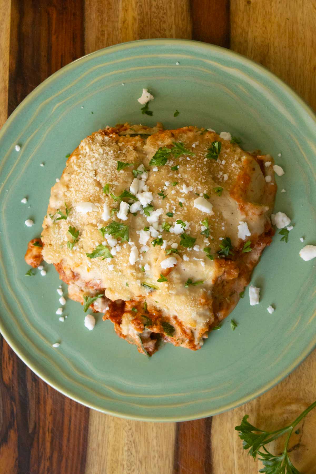 zucchini moussaka on a green plate