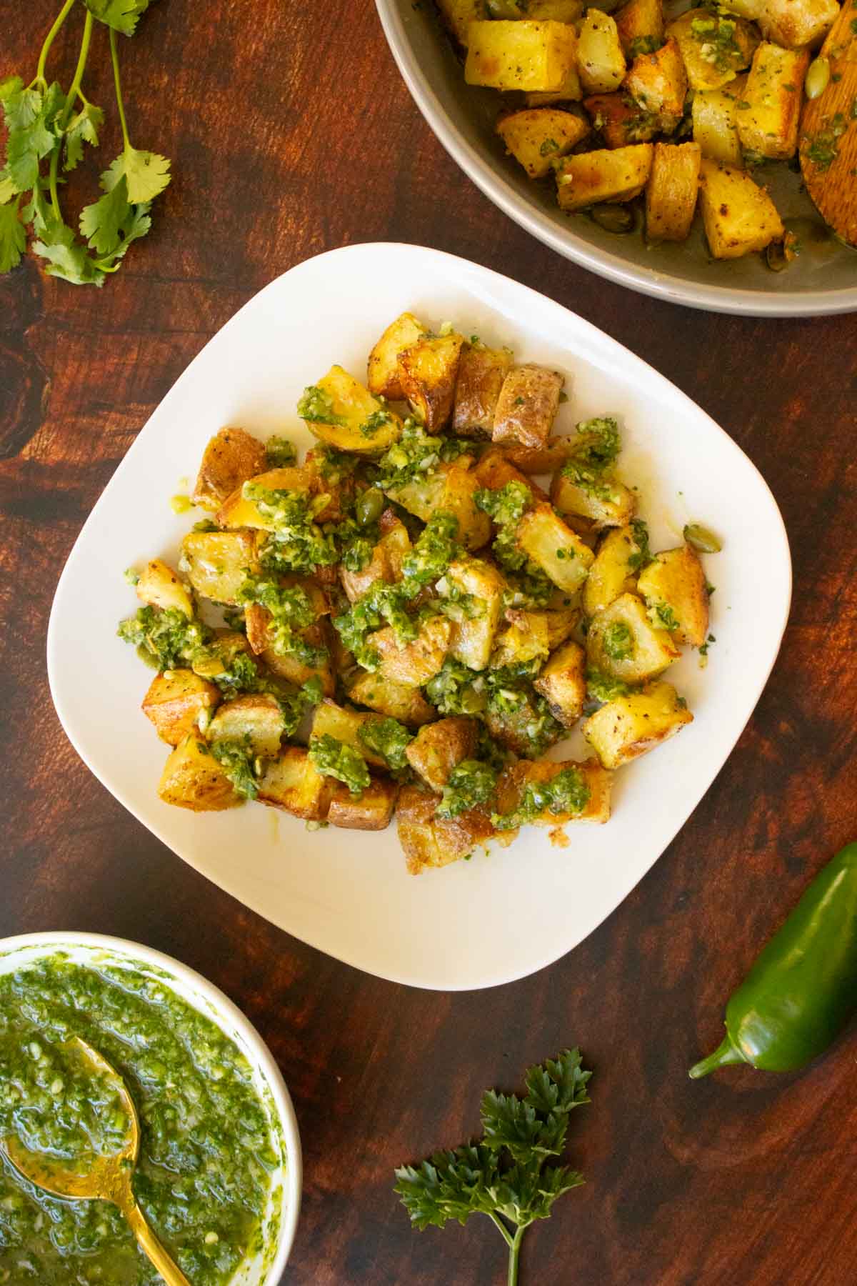 chimichurri potatoes on a white plate