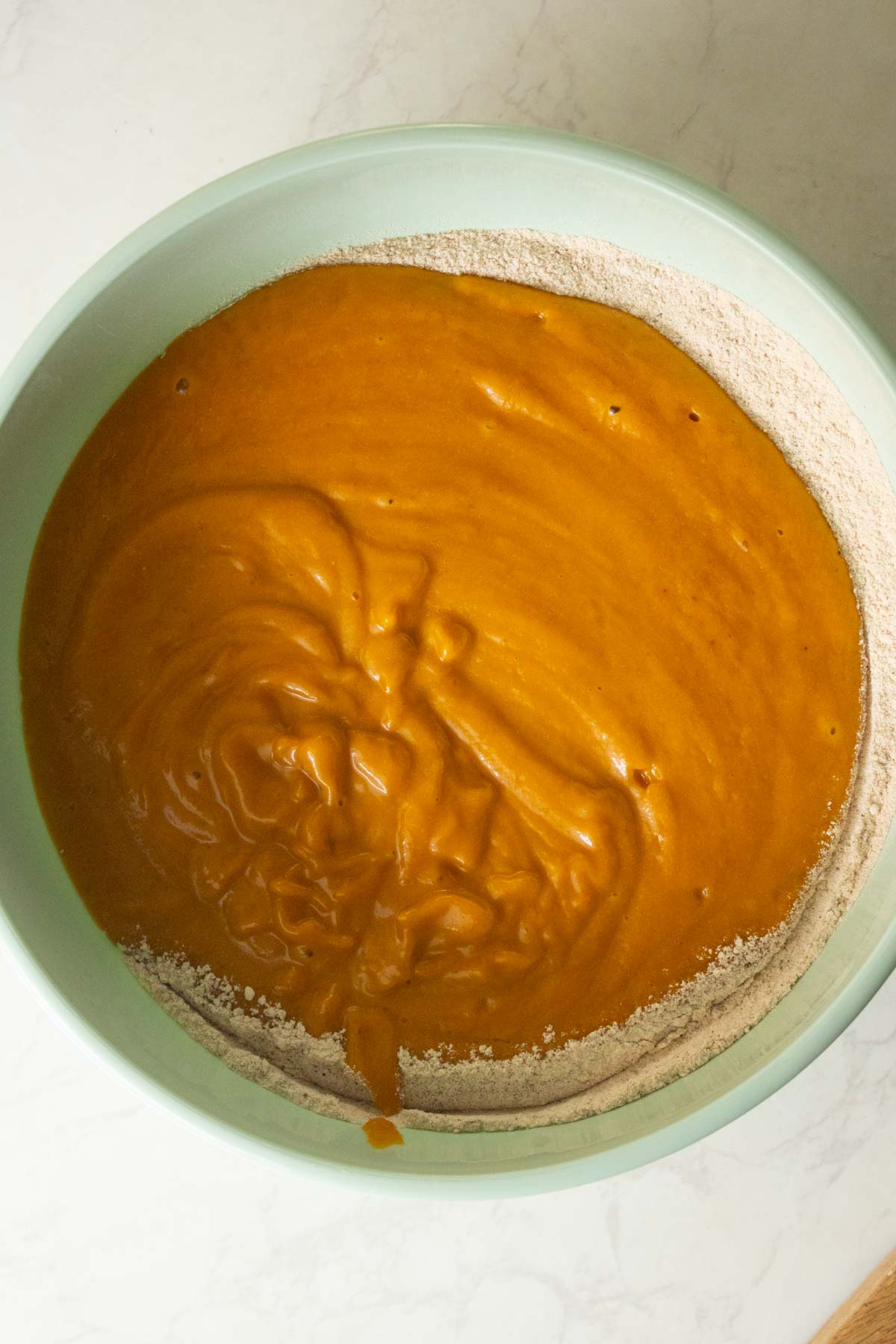 adding the wet ingredients to the dry