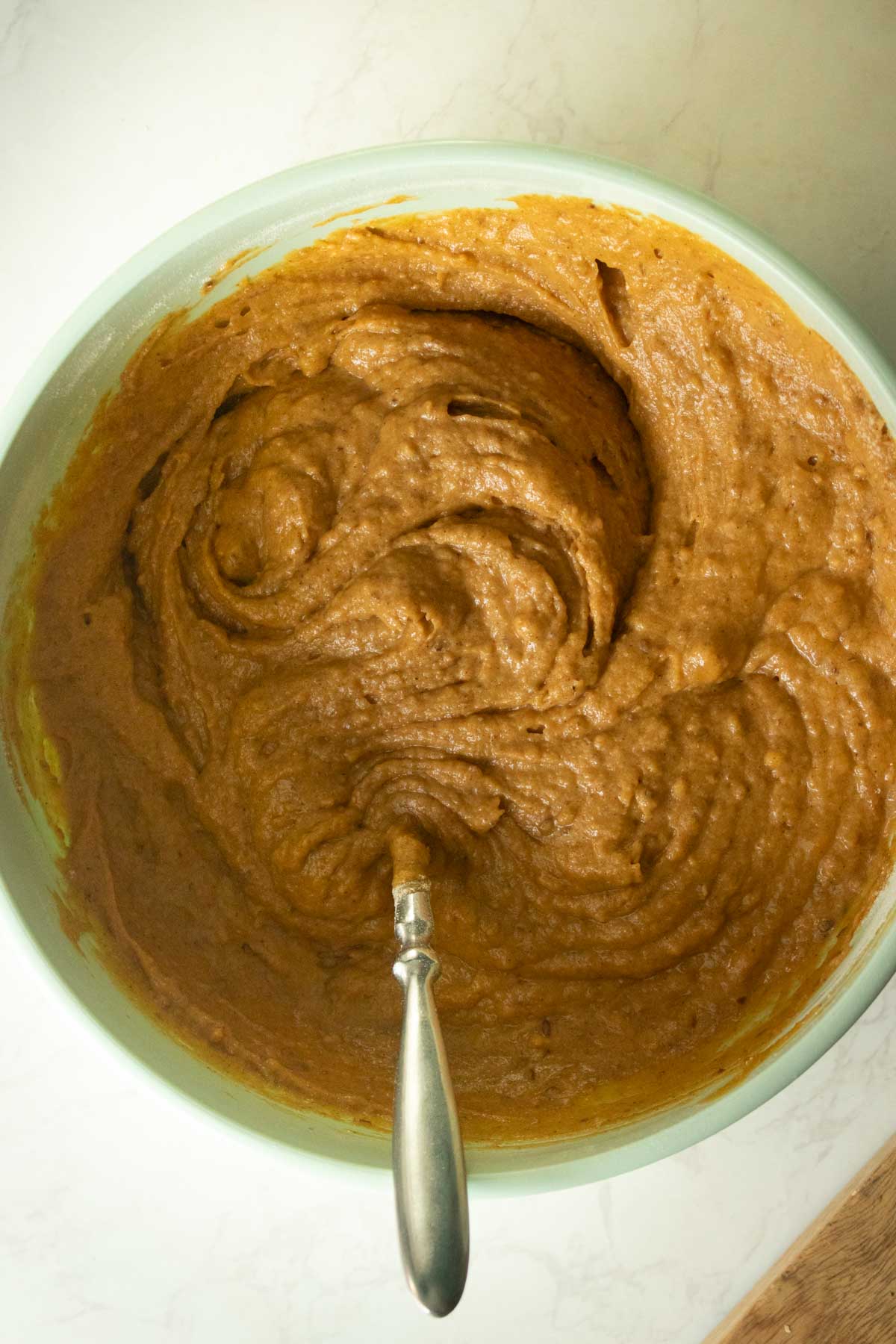 pumpkin banana bread muffin batter ready to scoop into the pan