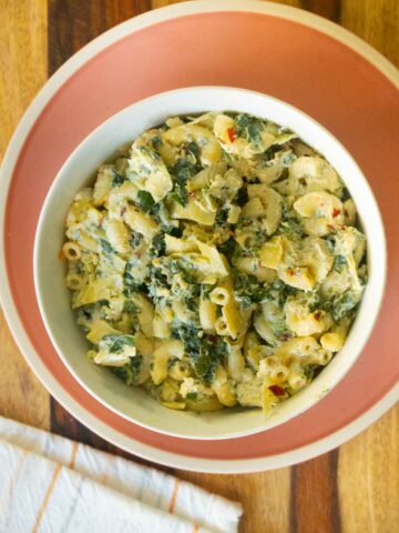 bowl of spinach artichoke mac and cheese
