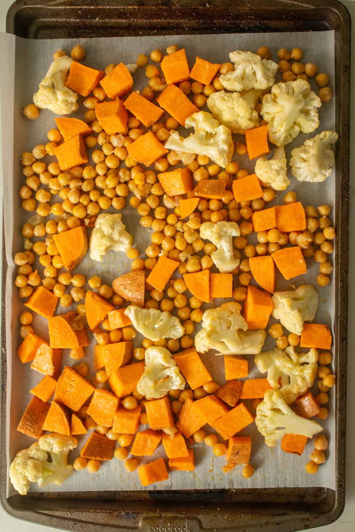 roasted veggies on the pan before baking