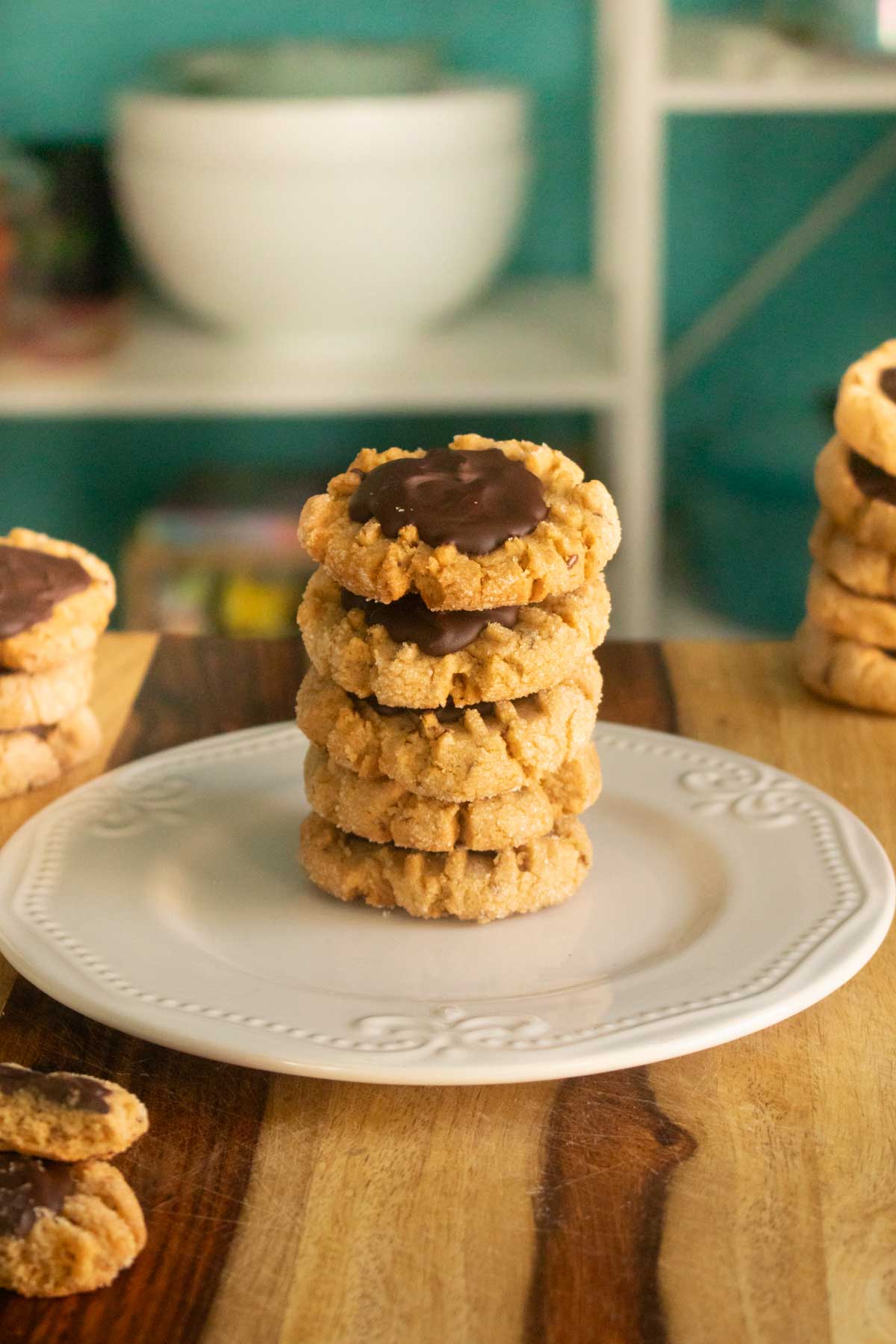 close-up of peanut butter chocolate cookies stacked on a plate