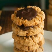 close-up of peanut butter chocolate cookies stacked on a plate