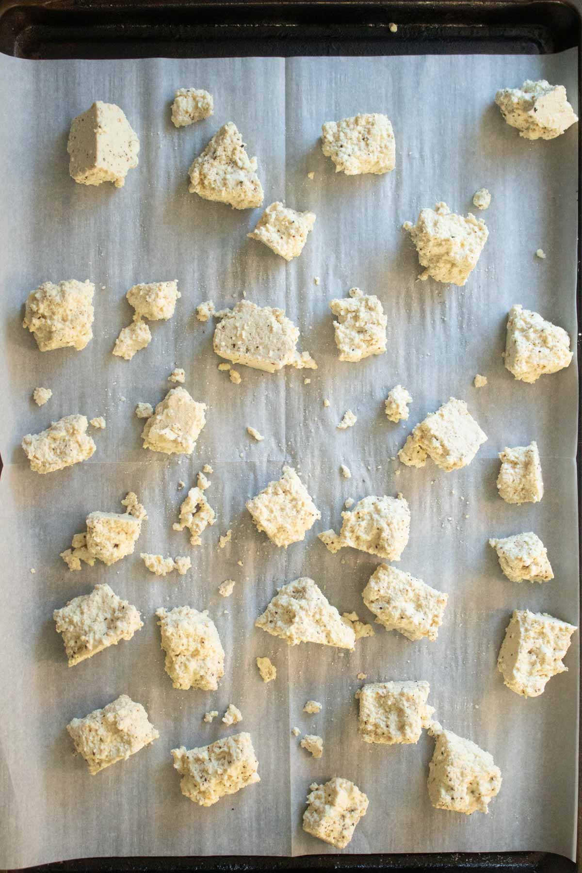 tofu on the sheet pan before baking