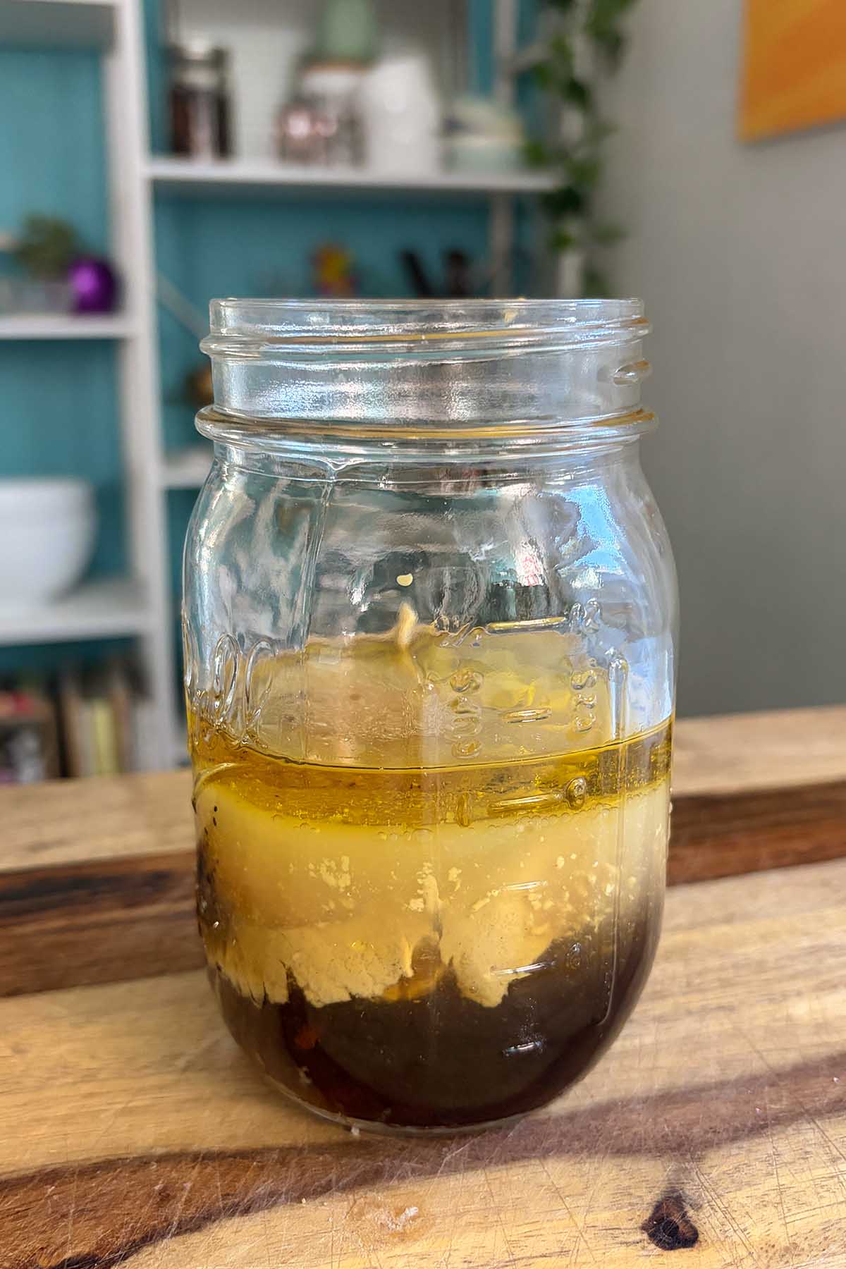 maple mustard dressing ingredients in the jar before mixing