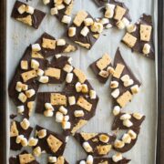 s'mores bark on the baking sheet after breaking it into pieces